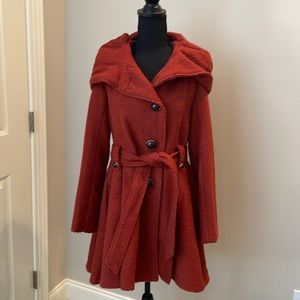 Steve Madden coat in deep orange color, decorative buttons, tie belt and hood